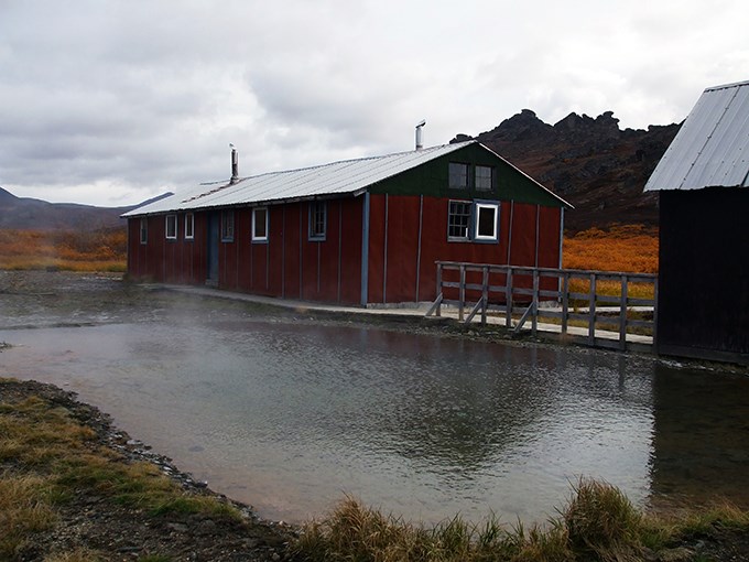 The bunkhouse at Serpentine Hot Springs with the tors in the distance.